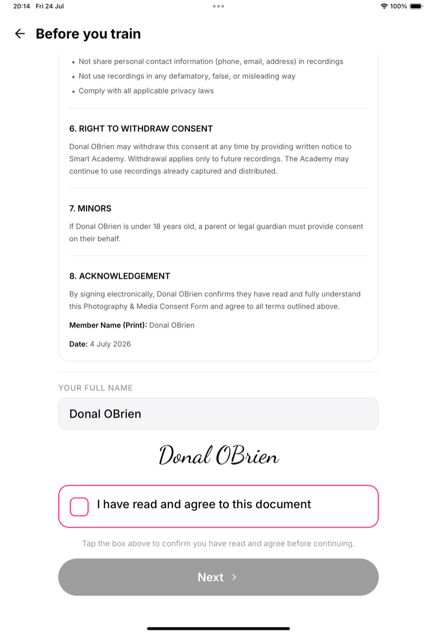 Name confirmed, signature rendered, one tick to agree